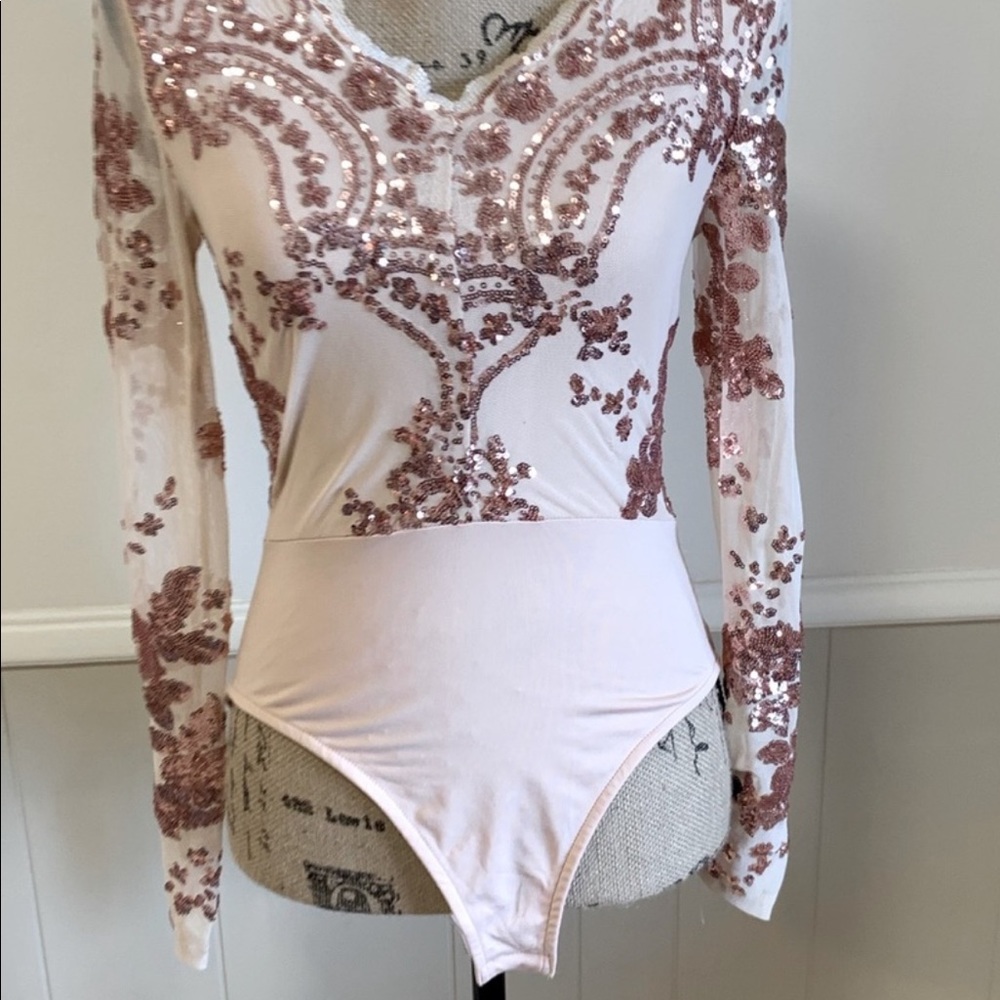 Peachy nude body suit!